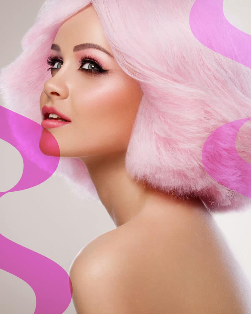 woman with bright pink hair and makeup