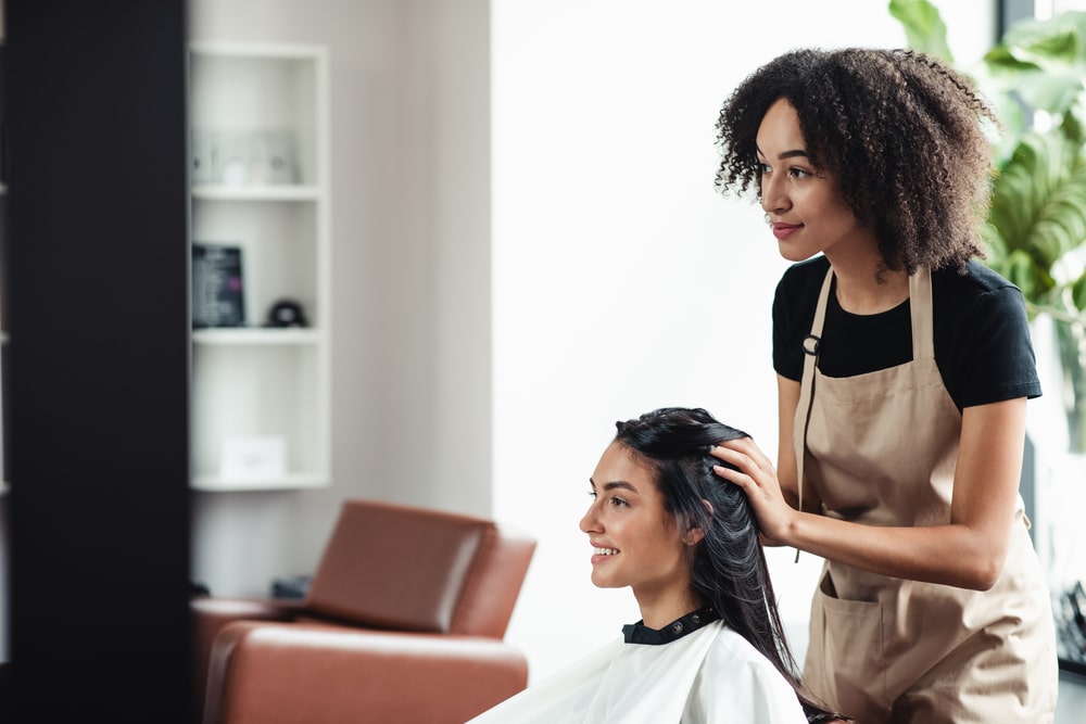 hairstylist doing a clients hair